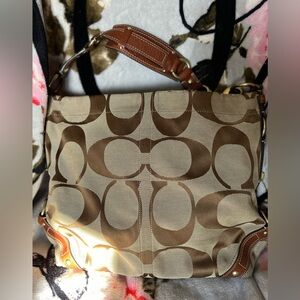 Preowned used condition Coach signature logo bag F10620